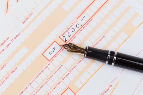 Fountain Pen on Remittance slip — Stock Photo, Image