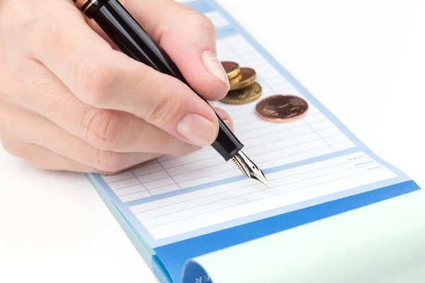 Receipt Book Fountain Pen and coin — Stock Photo, Image