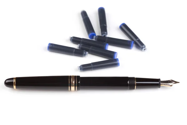 Fountain pen and cartridges — Stock Photo, Image