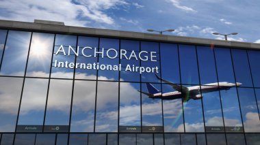 Anchorage, Alaska 'ya iniş yapan bir jet uçağı. Cam havaalanı terminali ve uçağın yansıması ile şehre varış. Seyahat, turizm ve ulaşım kavramı.
