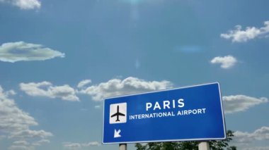 Jet uçağı Paris Fransa 'ya iniyor. Havaalanı istikameti işaretli şehir gelişi. Seyahat, iş, turizm ve ulaşım kavramı.