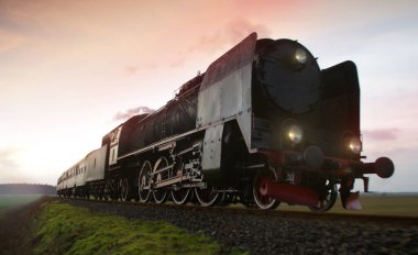 Retro dumanlı buhar lokomotifi. Eski demiryolu hattındaki eski yolcu treni..