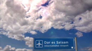Jet uçağı Dar es Salaam, Tanzanya 'ya iniyor. Havaalanı istikameti işaretli şehir gelişi. Seyahat, iş, turizm ve ulaşım konsepti. 3B canlandırma canlandırması.