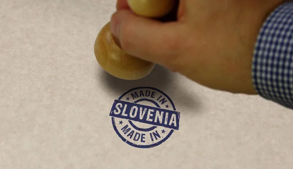スロベニアのスタンプとスタンピングの手で作られた 製造業 生産国の概念 — ストック写真