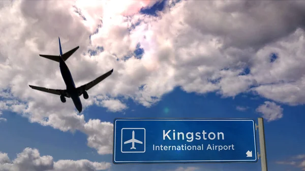 飞机的轮廓降落在牙买加金斯敦 城市到达与国际机场方向的标志板和蓝天为背景 旅行和运输概念 — 图库照片