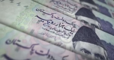 Pakistan banknot döngüsü. PKR para dokusu. Ekonomi, ticaret, kriz, bankacılık, durgunluk, Pakistan 'da borç ve finans kavramı. Notayı kaydırıyorum. Döngüsüz 3D canlandırma.