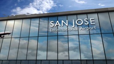San Jose, California, Kosta Rika 'ya inen uçaklar animasyonu canlandırıyor. Cam havaalanı terminali ve jet uçağının yansıması. Seyahat, varış, iş, turizm ve ulaşım kavramı.