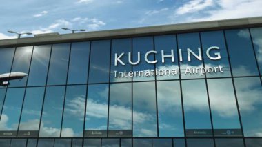 Malezya, Kuching 'e uçak iniyor. Cam havaalanı terminali ve jet uçağının yansımasıyla şehre vardık. Seyahat, iş, turizm ve ulaşım 3D konsepti.