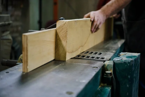 Work table of a carpenter with a gouge and a pile of wood chips. Vercion 3