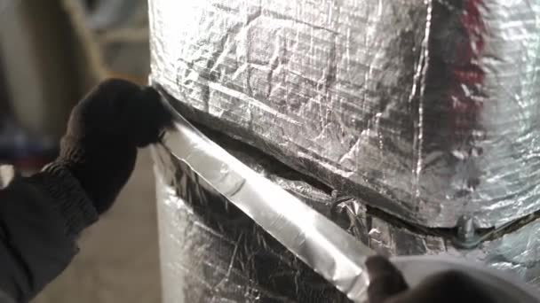 Working with metal tape, insulates the ventilation elements. Close up — Stock Video