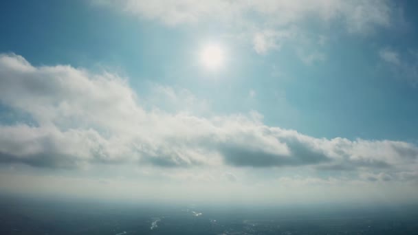 Aerial drone view. Flying in the clouds above city — Stock Video