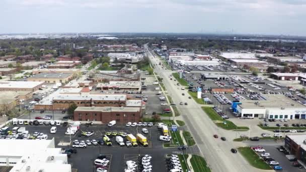 Suburban shopping center and general store near big road, move aerial drone wide view — Stock Video