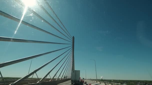 POV view from the cab of a car driving on a highway on a high bridge — Stockvideo