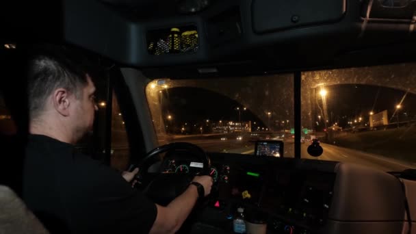 Truck driver rides to destination cargo at road on night. Slow motion Close up — Stock Video