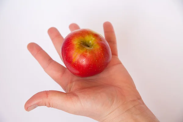 Manzana en mano — Foto de Stock