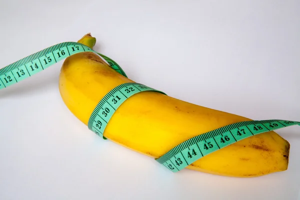 Банан з лінійкою — стокове фото