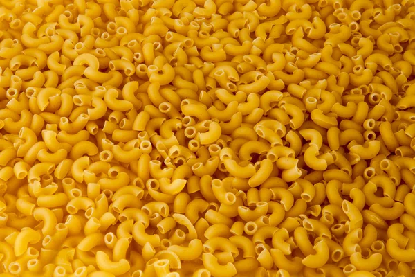 Dry pasta background — Stock Photo, Image