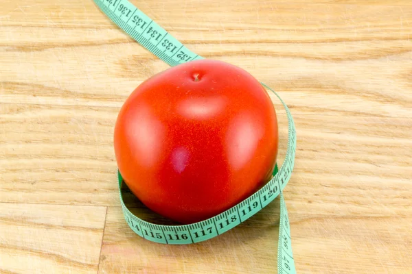 Dieta usando o conceito de tomates vermelhos — Fotografia de Stock