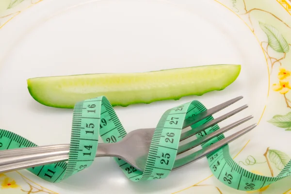 Pepino con cinta métrica —  Fotos de Stock