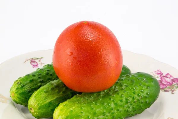 Cucumber and tomato with measuring — Stock Photo, Image