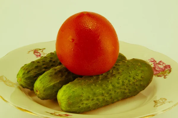 Cucumber and tomato with measuring — Stock Photo, Image