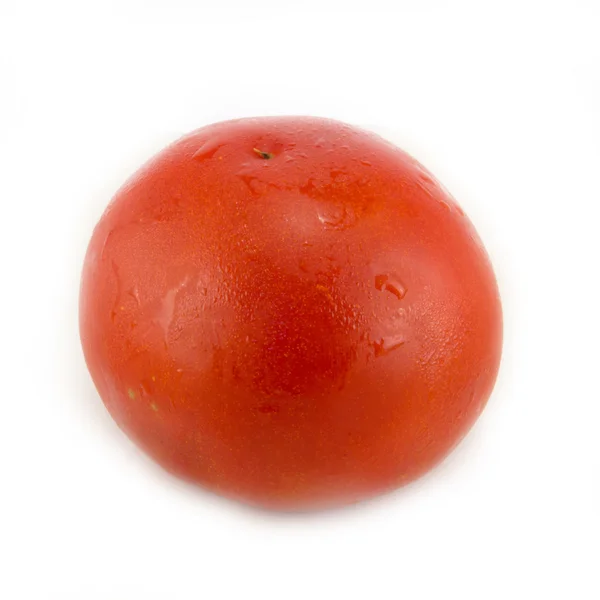 Tomato on a white plate — Stock Photo, Image