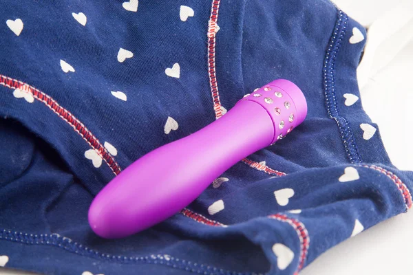 beyaz üzerine titreşimli seks oyuncak