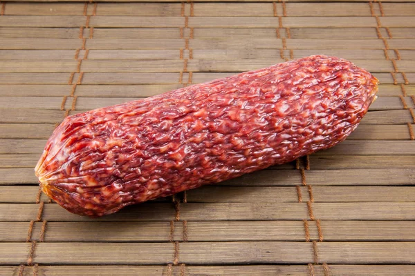 Salami isolated on a vintage background — Stock Photo, Image