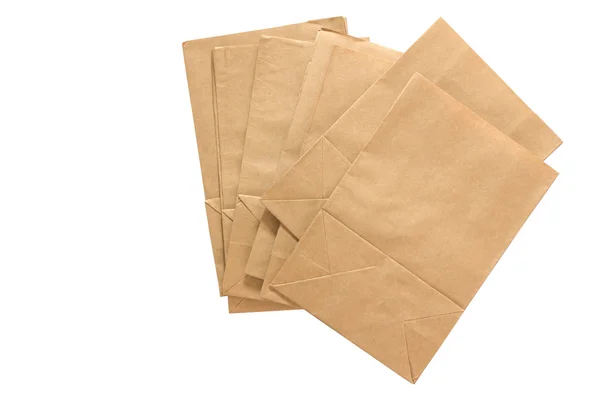 Bruine papieren zak op zwarte achtergrond — Stockfoto