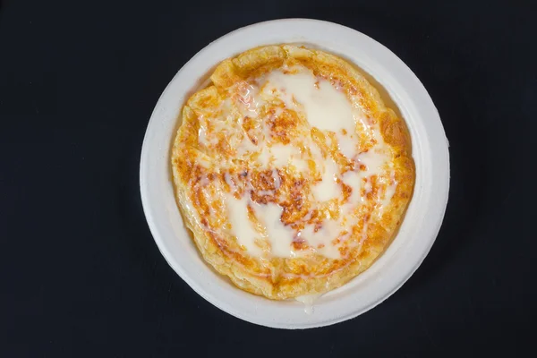 Roti a zahuštěné mléko na vrcholu — Stock fotografie