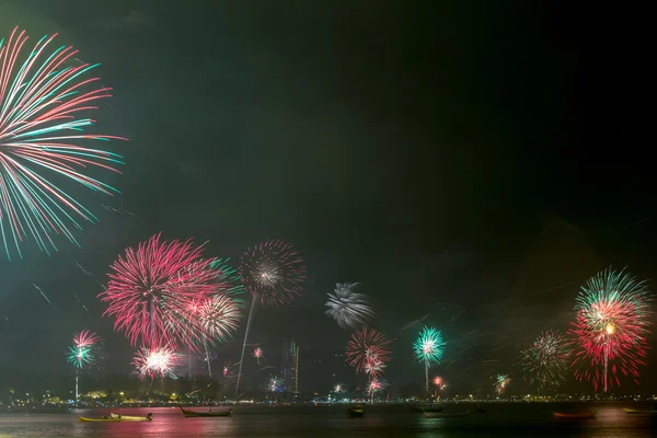 Beautiful fireworks celebrating new year on patong beach thailan — Stock Photo, Image