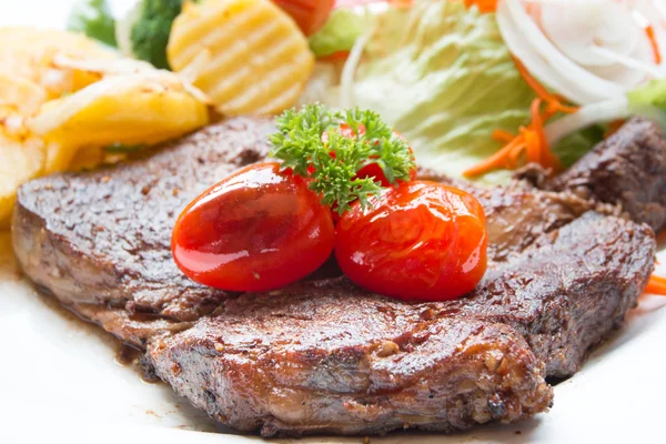 Grilled steak meat with salad from baked pepper — Stock Photo, Image