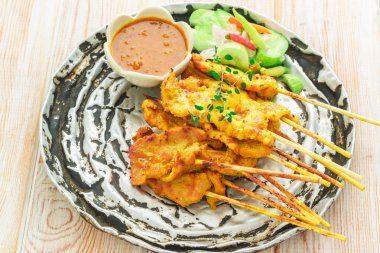 Domuz eti Satay, geleneksel Tay biftek domuz kavrulmuş.