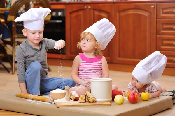 Siblings Boys Girl Chef Hats Fireplace Sitting Kitchen Floor Soiled — Stock Photo, Image