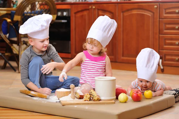 Siblings Boys Girl Chef Hats Fireplace Sitting Kitchen Floor Soiled — Stock Photo, Image