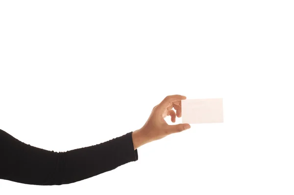 Vrouwelijke hand met een visitekaartje geïsoleerd op witte achtergrond — Stockfoto