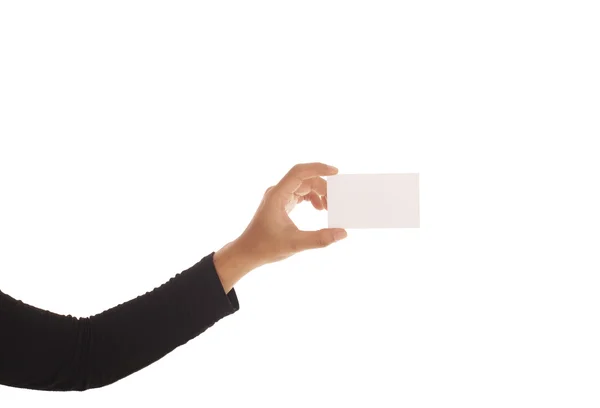 Mano femenina sosteniendo una tarjeta de visita aislada sobre fondo blanco — Foto de Stock