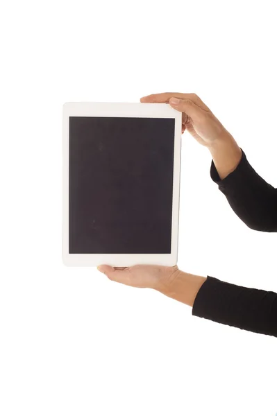 Egy tablet érintőképernyős számítógép szerkentyű izolátum tartó női kezek Stock Kép