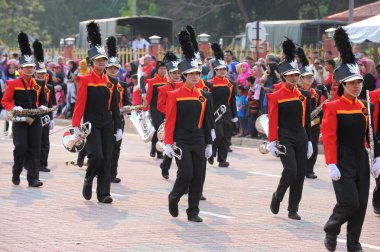 Kuantan-Ağustos 31:Malaysians üzerinde 31 Ağustos 2015 yılında Kuantan, Pahang, Malezya bağımsızlık 58 yaşını kutluyor Ulusal günü yürüyüşü, katılmak.