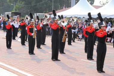 Kuantan-Ağustos 31:Malaysians üzerinde 31 Ağustos 2015 yılında Kuantan, Pahang, Malezya bağımsızlık 58 yaşını kutluyor Ulusal günü yürüyüşü, katılmak.