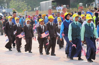 Kuantan-Ağustos 31:Malaysians üzerinde 31 Ağustos 2015 yılında Kuantan, Pahang, Malezya bağımsızlık 58 yaşını kutluyor Ulusal günü yürüyüşü, katılmak.