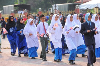 Kuantan-Ağustos 31:Malaysians üzerinde 31 Ağustos 2015 yılında Kuantan, Pahang, Malezya bağımsızlık 58 yaşını kutluyor Ulusal günü yürüyüşü, katılmak.