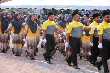 Kuantan-Ağustos 31:Malaysians üzerinde 31 Ağustos 2015 yılında Kuantan, Pahang, Malezya bağımsızlık 58 yaşını kutluyor Ulusal günü yürüyüşü, katılmak.