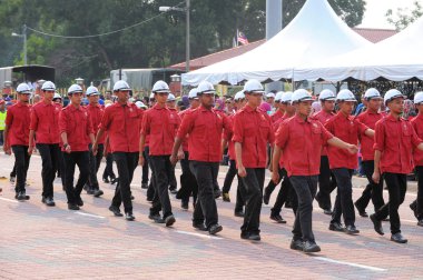 Kuantan-Ağustos 31:Malaysians üzerinde 31 Ağustos 2015 yılında Kuantan, Pahang, Malezya bağımsızlık 58 yaşını kutluyor Ulusal günü yürüyüşü, katılmak.