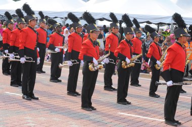 Kuantan-Ağustos 31:Malaysians üzerinde 31 Ağustos 2015 yılında Kuantan, Pahang, Malezya bağımsızlık 58 yaşını kutluyor Ulusal günü yürüyüşü, katılmak.