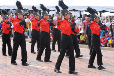 Kuantan-Ağustos 31:Malaysians üzerinde 31 Ağustos 2015 yılında Kuantan, Pahang, Malezya bağımsızlık 58 yaşını kutluyor Ulusal günü yürüyüşü, katılmak.