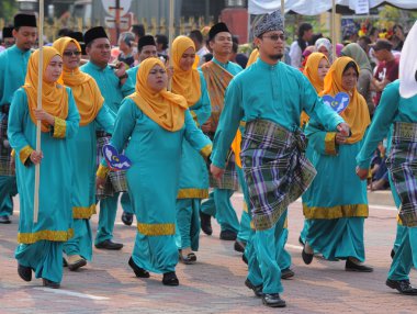 Kuantan-Ağustos 31:Malaysians üzerinde 31 Ağustos 2015 yılında Kuantan, Pahang, Malezya bağımsızlık 58 yaşını kutluyor Ulusal günü yürüyüşü, katılmak.
