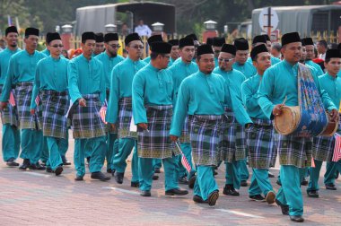 Kuantan-Ağustos 31:Malaysians üzerinde 31 Ağustos 2015 yılında Kuantan, Pahang, Malezya bağımsızlık 58 yaşını kutluyor Ulusal günü yürüyüşü, katılmak.