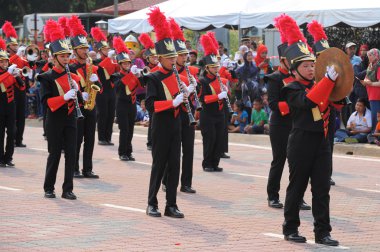 Kuantan-Ağustos 31:Malaysians üzerinde 31 Ağustos 2015 yılında Kuantan, Pahang, Malezya bağımsızlık 58 yaşını kutluyor Ulusal günü yürüyüşü, katılmak.