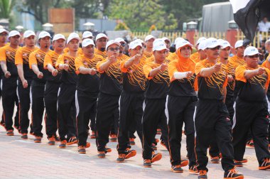 Kuantan-Ağustos 31:Malaysians üzerinde 31 Ağustos 2015 yılında Kuantan, Pahang, Malezya bağımsızlık 58 yaşını kutluyor Ulusal günü yürüyüşü, katılmak.